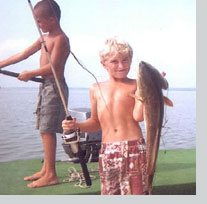 Captain Neal's grandson on a fishing charter